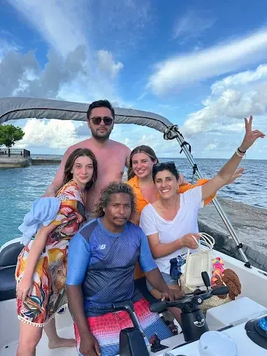 Hamid guiding guests from his boat in Ukulhas